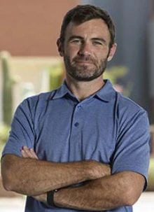 James Galligan, PhD, outside the UArizona College of Pharmacy (Photo: Kris Hanning/University of Arizona Health Sciences)