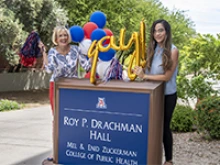 Chris Tisch, assistant dean of the Mel and Enid Zuckerman College of Public Health, and Gisela Ochoa take a moment to celebrate during the college’s virtual ceremony filming. Their graduation will be celebrated May 15. (Photo: UArizona Health Sciences/Noelle Haro-Gomez)