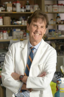 Nicholas A. Delamere, PhD