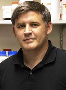 Tim Bolger, PhD, research investigator in his laboratory at the University of Arizona. (Photo: Michele Vaughn/UArizona Department of Molecular and Cellular Biology)