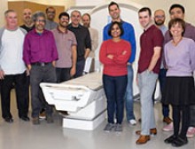 Research team by MRI scanner (left to right): Kevin Johnson
