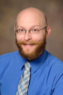 Chris Edwards, PharmD, BCPS, an assistant professor in the Department of Pharmacy Practice and Science