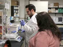 Left to right: Dr. David Encinas, Postdoctoral Research Associate, and Dr. Heidi Mansour, collaborating in the lab. (Photo: Paul Tumarkin/Tech Launch Arizona)