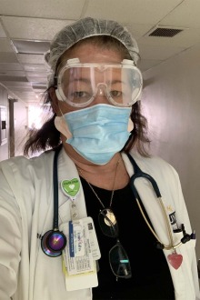 Niki Putzar-Davis, MSN, ACNP-BC dressed-out in PPE during a shift at Carondelet St. Mary's Hospital last summer during the COVID-19 pandemic.
