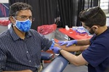 Deepta Bhattacharya, PhD, gets blood drawn for the antibody test he helped develop. (Photo: University of Arizona Health Sciences, Kris Hanning)