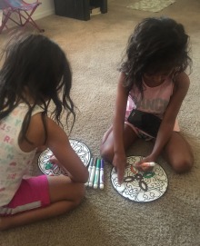 Kids in the Gastelum family color mandalas as part of an exercise in mindfulness during the Healthy 2B Me camp.