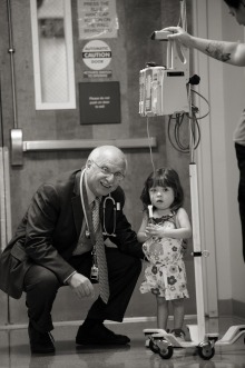 Fayez K. Ghishan, MD, with a young patient at Steele Children’s Research Center.